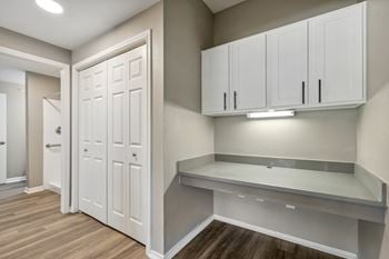 Built-in desk with cabinetry and lighting*